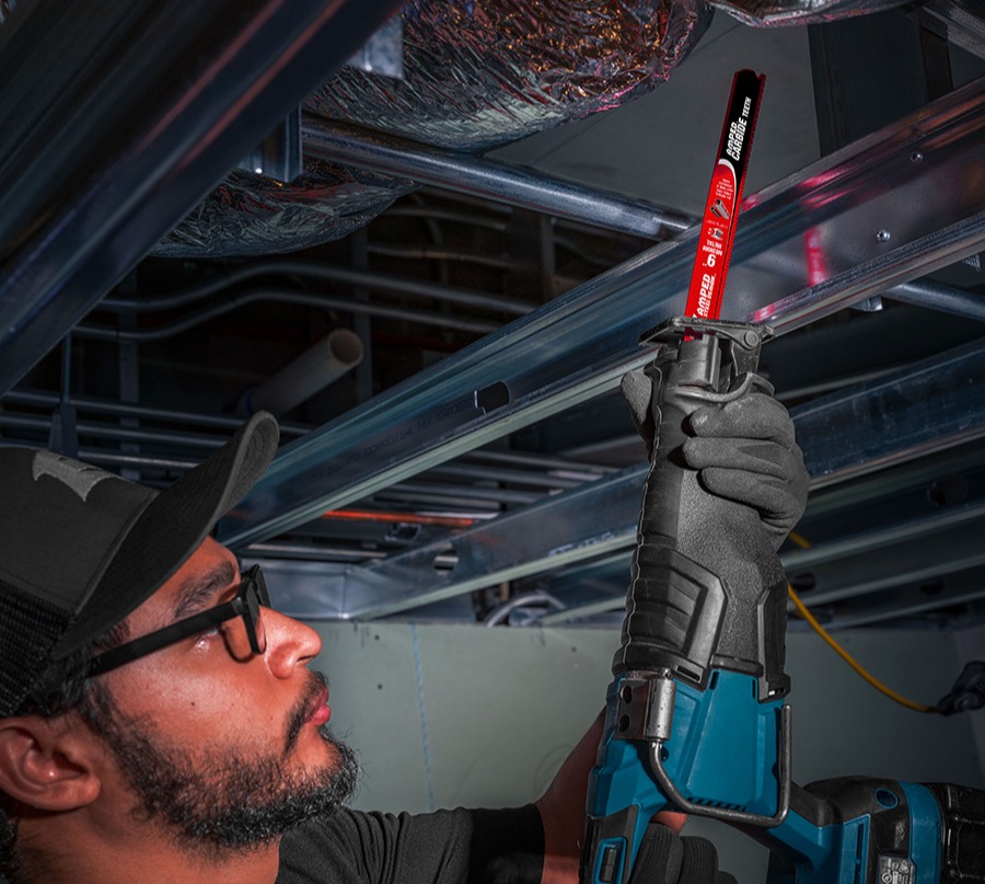 Electrician cutting medium metal 